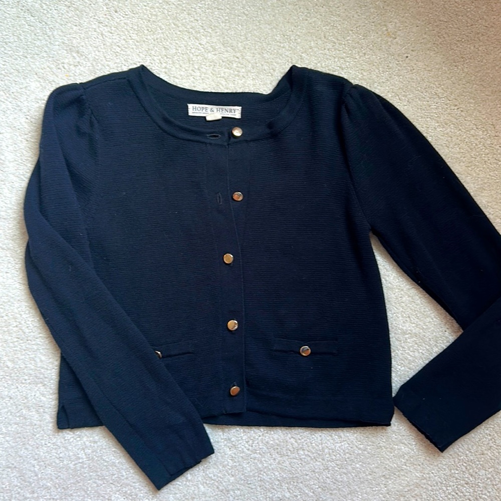 Black Hope and Henry cropped sweater with brass buttons.
